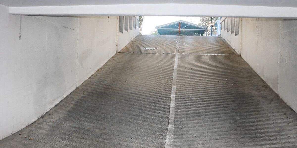 Tiefgaragen-Stellplatz in Unterhaching, Ottobrunner Straße zu erwerben. Ideal zur Eigennutzung! zimmer