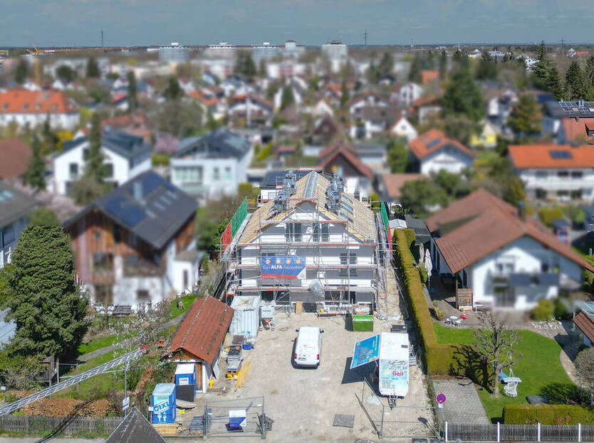 Grundstück mit Doppelhaushälfte im bereits erstellten Rohbau mit schönem Südgarten
