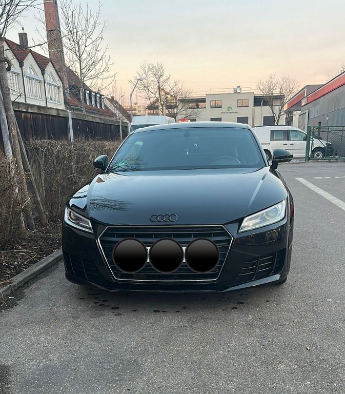 TT