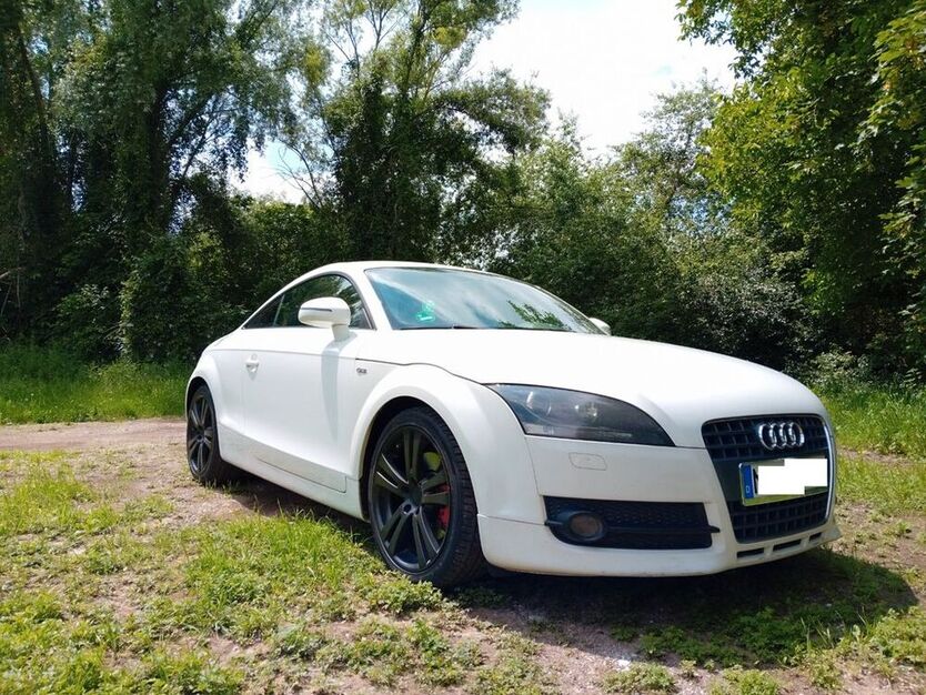 TT