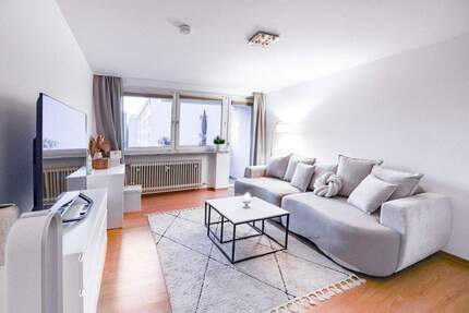 Aigner Immobilien GmbH - Vermietet: Schickes, sehr gepflegtes Apartment mit Balkon in guter Lage 1 zimmer