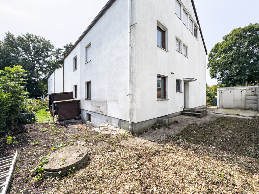 WINDISCH ImmobilieN - Sanierungsbedürftige DHH mit viel Potential in verkehrsberuhigter Straße