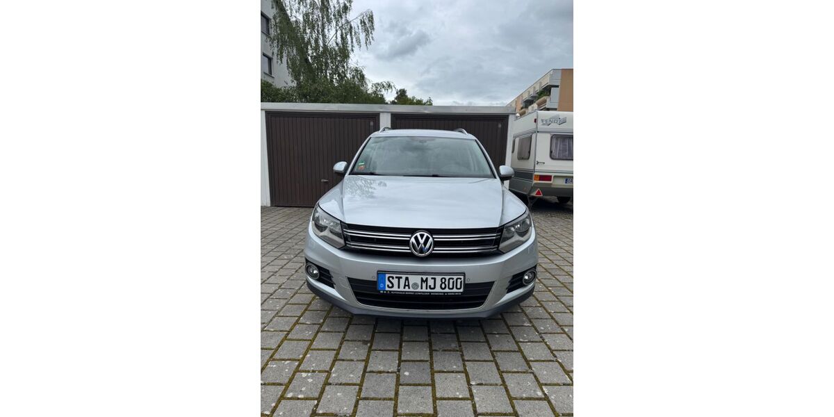VW Tiguan 147.458 km 9.500 &euro; Gilching 82205