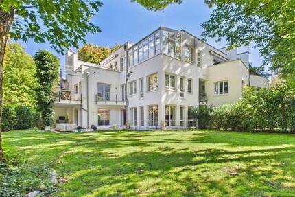 Isar-Exklusivität pur - Maisonette mit 430 m² Privatgarten und Haus-Charakter