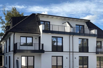 QUALITÄT + KOMFORT ! NEUBAU-3-Zimmer-Gartenwohnung mit sonniger Terrasse zzgl. taghellem Souterrainbereich 5 zimmer