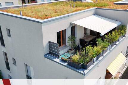 Bald bezugsfrei! Lichtdurchflutete 4-Zimmer-Dachterrassenwohnung mit Blick ins Grüne in München-Riem 4 zimmer