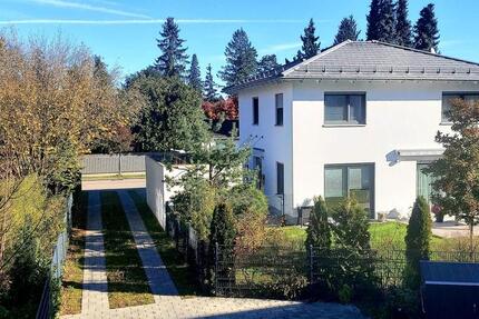 Villa in GräfelfingLochham in Massivbauweise zimmer