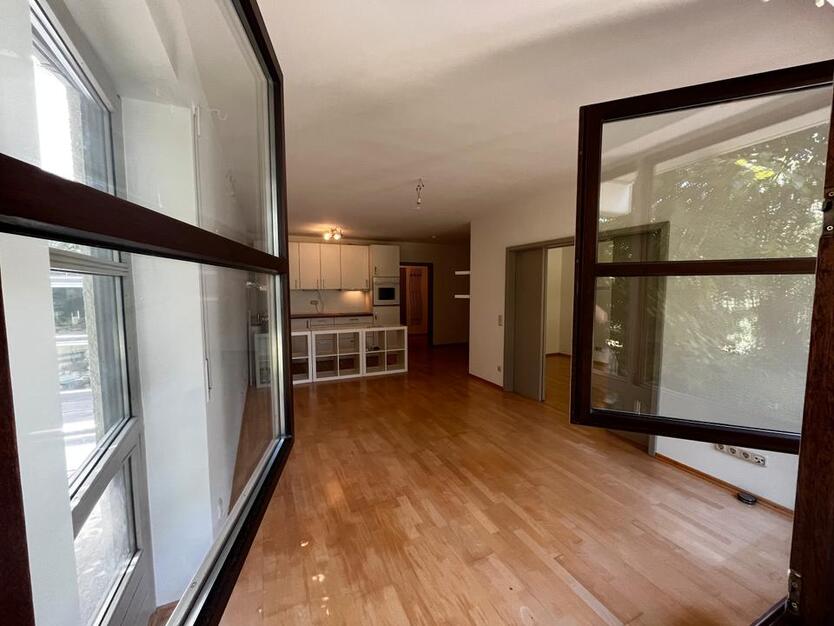 1,5-Zimmer-Wohnung mit Gartenanteil und Tiefgarage