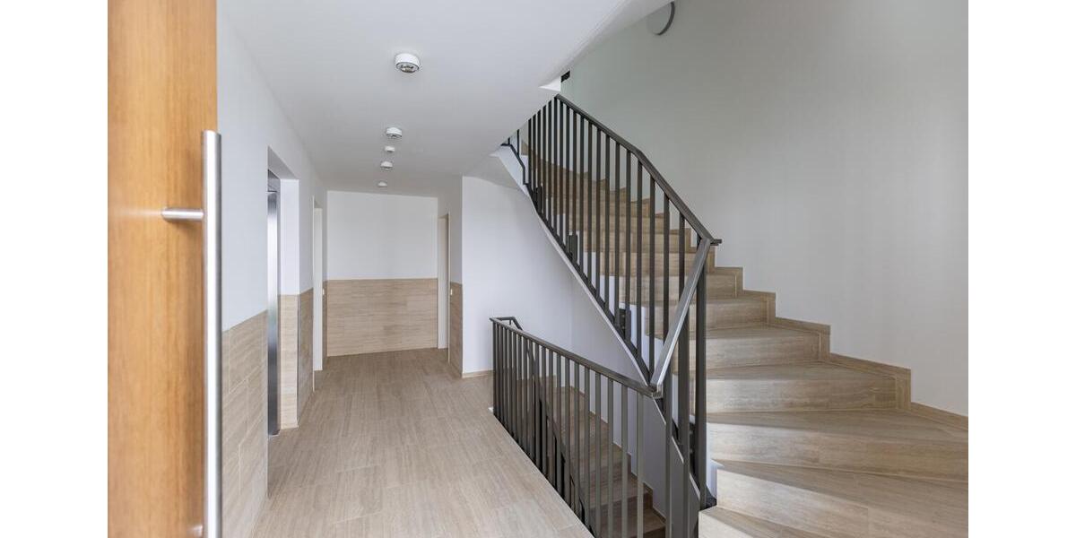 Erstbezug: 2-Zi-Gartenwohnung mit Einbauküche, 2 Terrassen und TG-Einzelstellplatz 2 zimmer