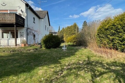 Rarität in Ismaning: Doppelhaushälfte auf 850 m² Traumgrundstück mit Potenzial - Haus Ismaning | Angebot:26001741