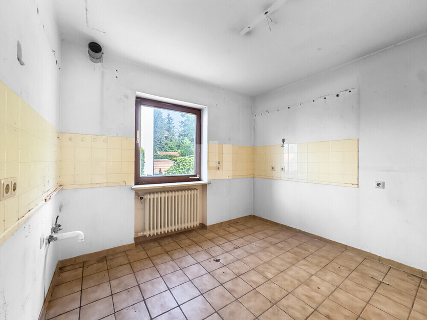 WINDISCH ImmobilieN - Sanierungsbedürftige DHH mit viel Potential in verkehrsberuhigter Straße