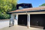 Charmantes, vermietetes Doppelhaus für zwei Familien mit großem Garten und viel Potential