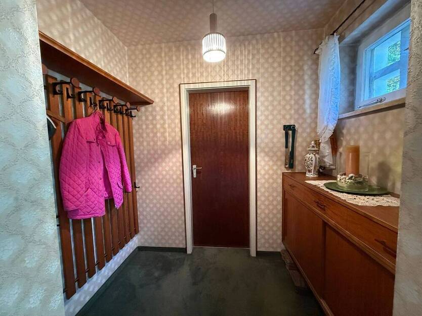 Charmante, gepflegte DHH mit großem Garten und Potential